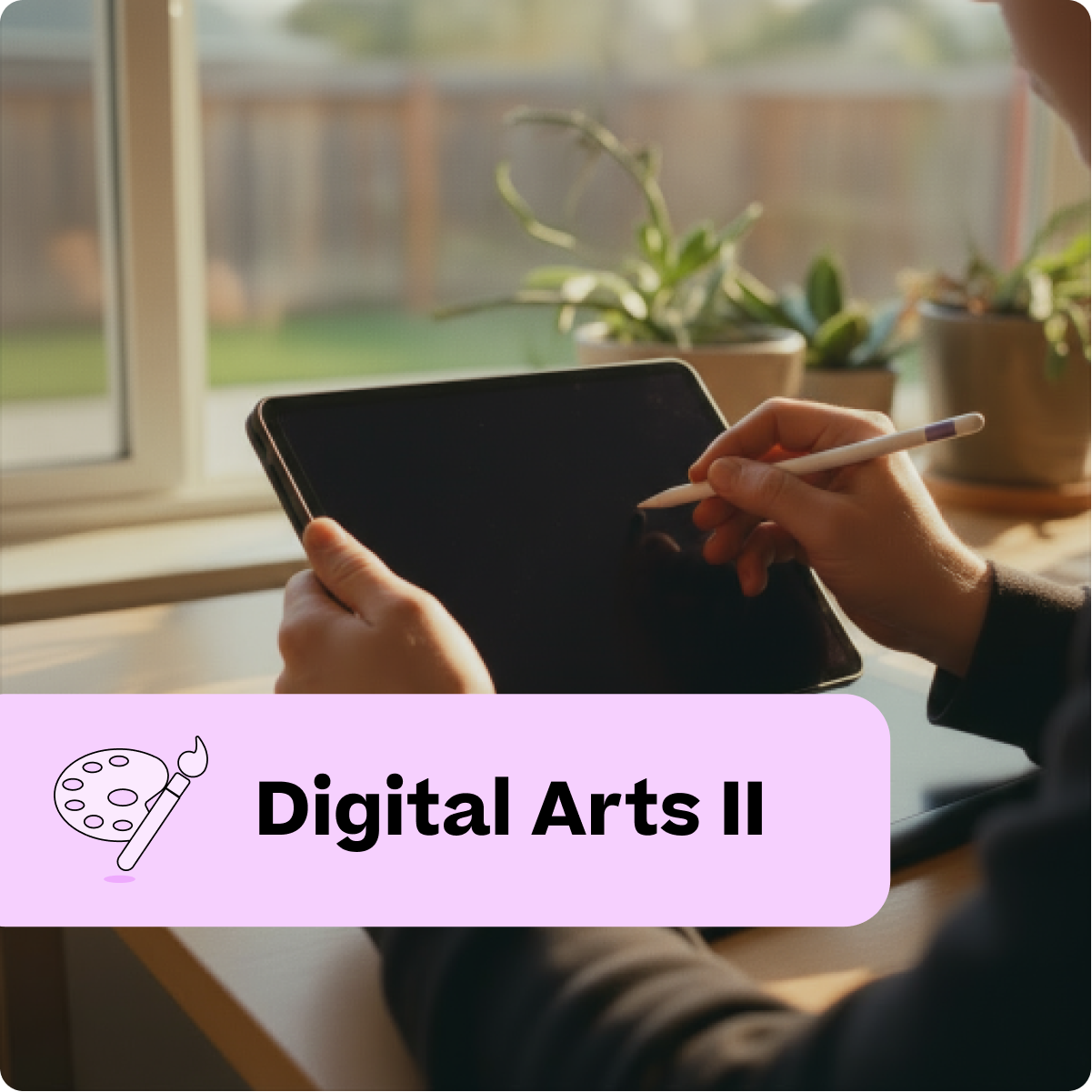 Person using a tablet with stylus at a desk with plants, labeled 'Digital Arts II'.