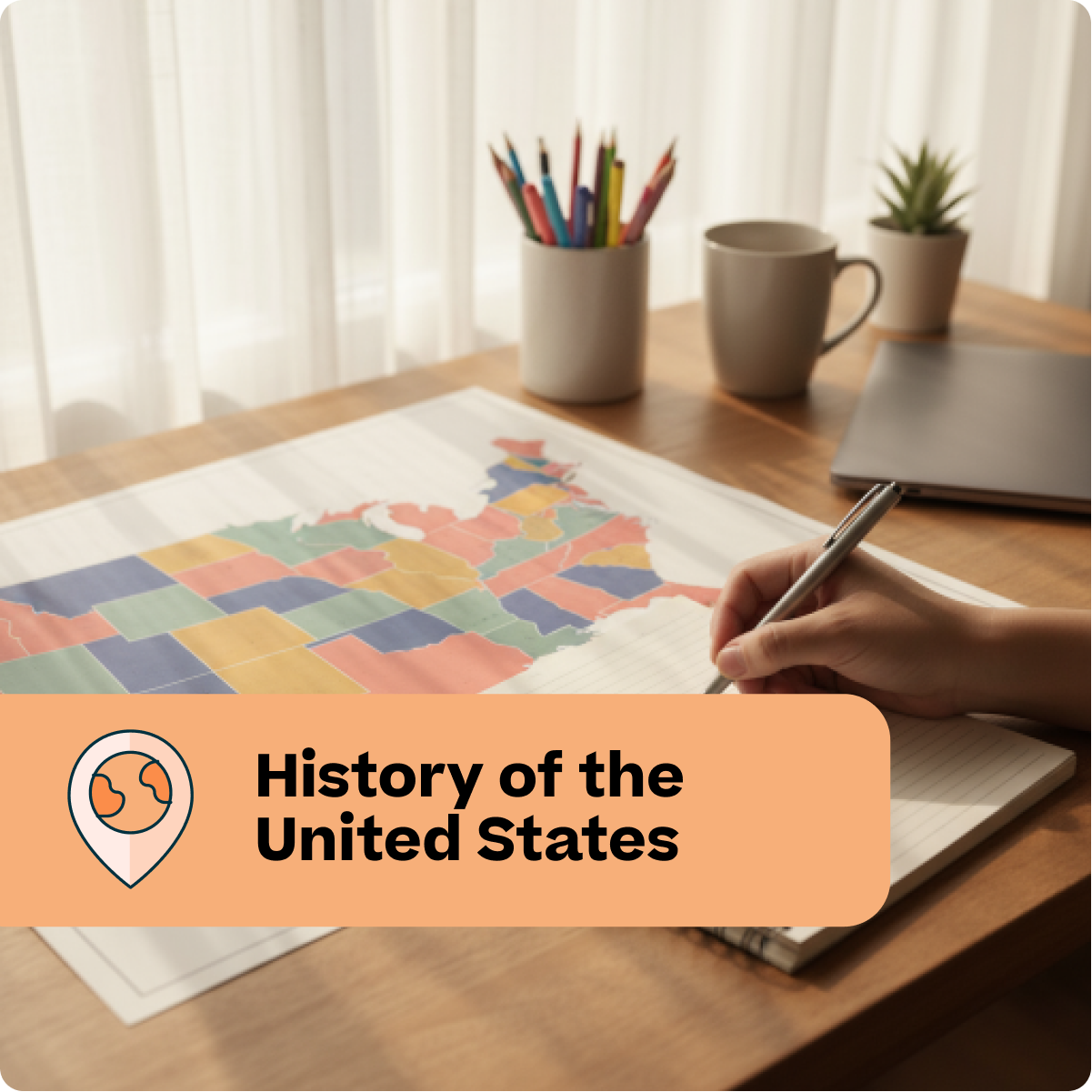 Person coloring a map of the United States with colored pencils on a desk.