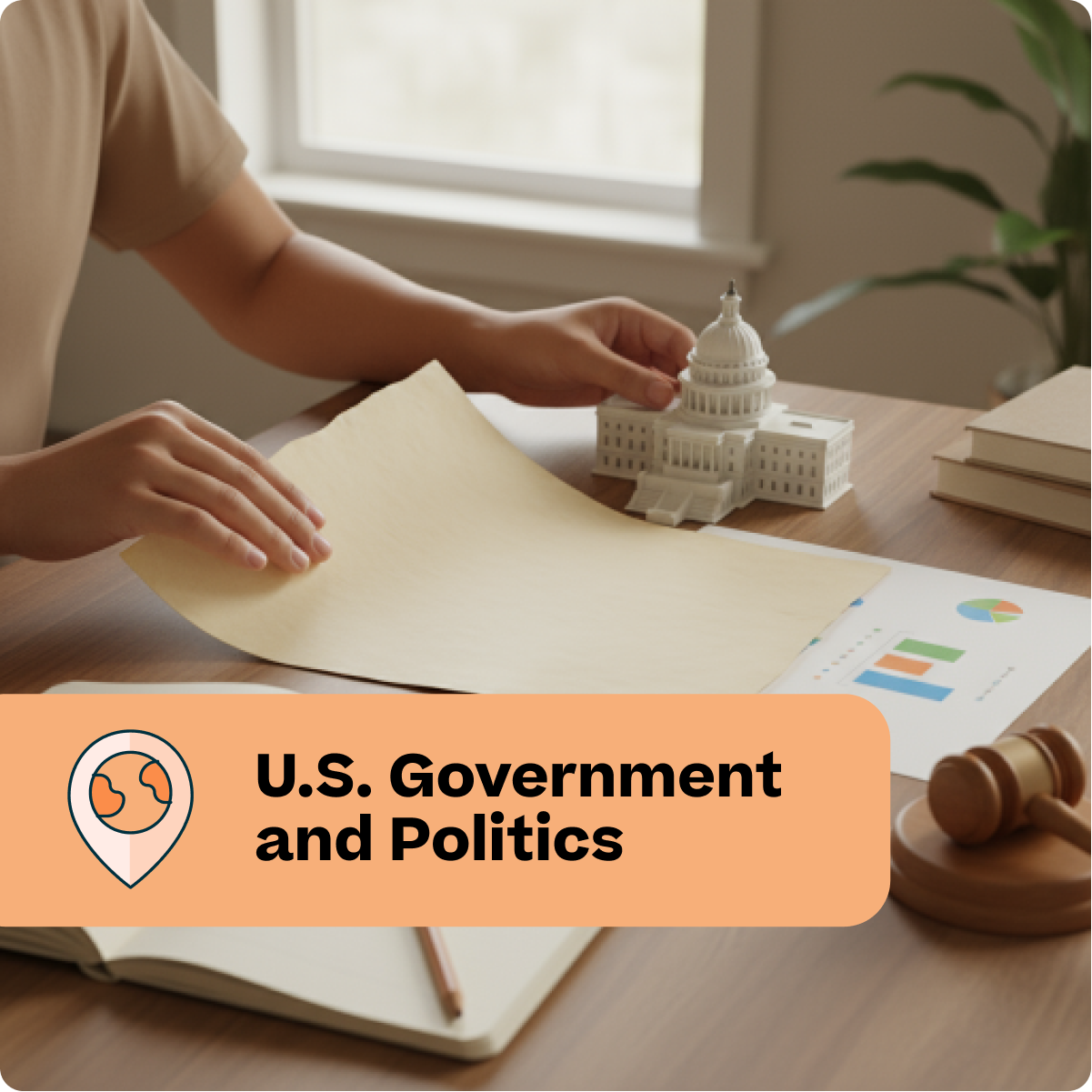 Person working on a document with a U.S. Capitol model and gavel on a desk, labeled 'U.S. Government and Politics'.