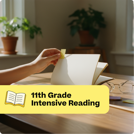 Person reading a book with a yellow label indicating '11th Grade Intensive Reading' on a desk.