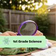 Person using a magnifying glass outdoors with a '1st Grade Science' label.