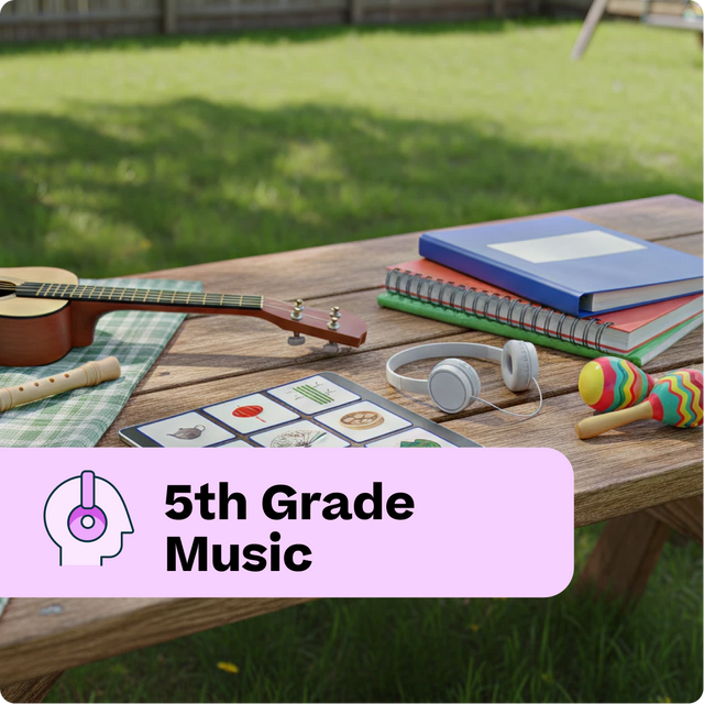 Music-related items on a wooden table outdoors, with a '5th Grade Music' label.