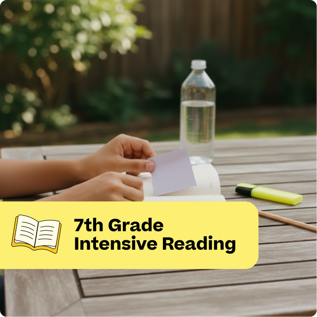 Person reading a book outdoors with a water bottle and highlighter on a wooden table.