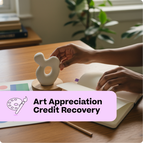 Person holding a small white sculpture on a wooden table with books and a plant in the background.