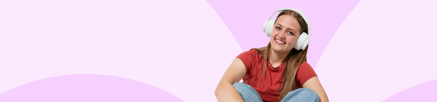 Woman wearing headphones sitting on a colorful background