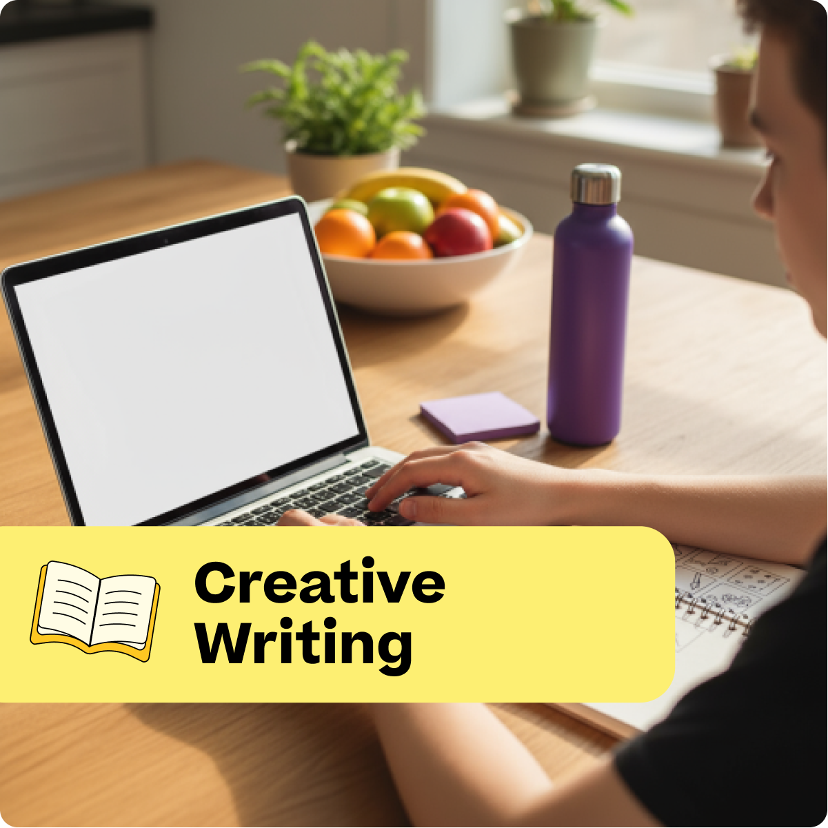 Person using a laptop with a bowl of fruit and purple water bottle on a table, labeled 'Creative Writing'.