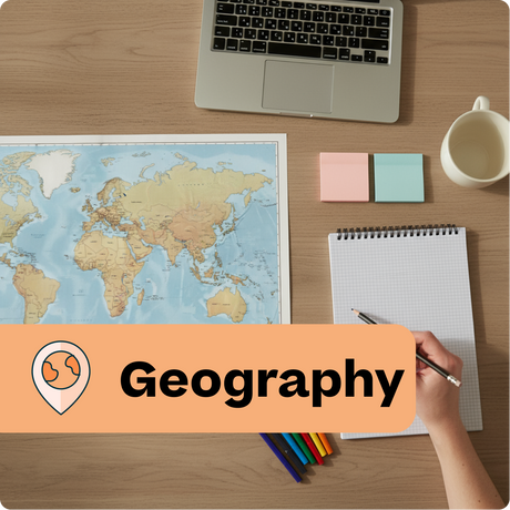 Desk with world map, laptop, notebook, and colorful pencils with 'Geography' label.