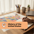 Person coloring a map of the United States with colored pencils on a desk.
