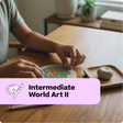 Person working on a mosaic art project with text 'Intermediate World Art II' on a wooden table.
