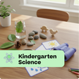 Educational items on a table with 'Kindergarten Science' text overlay